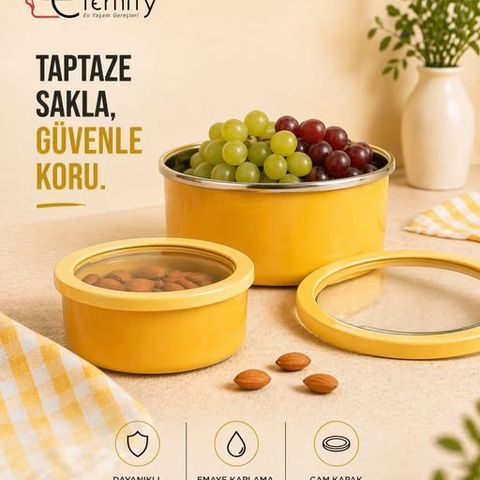 Grapes and almonds in yellow enamel storage containers with glass lids